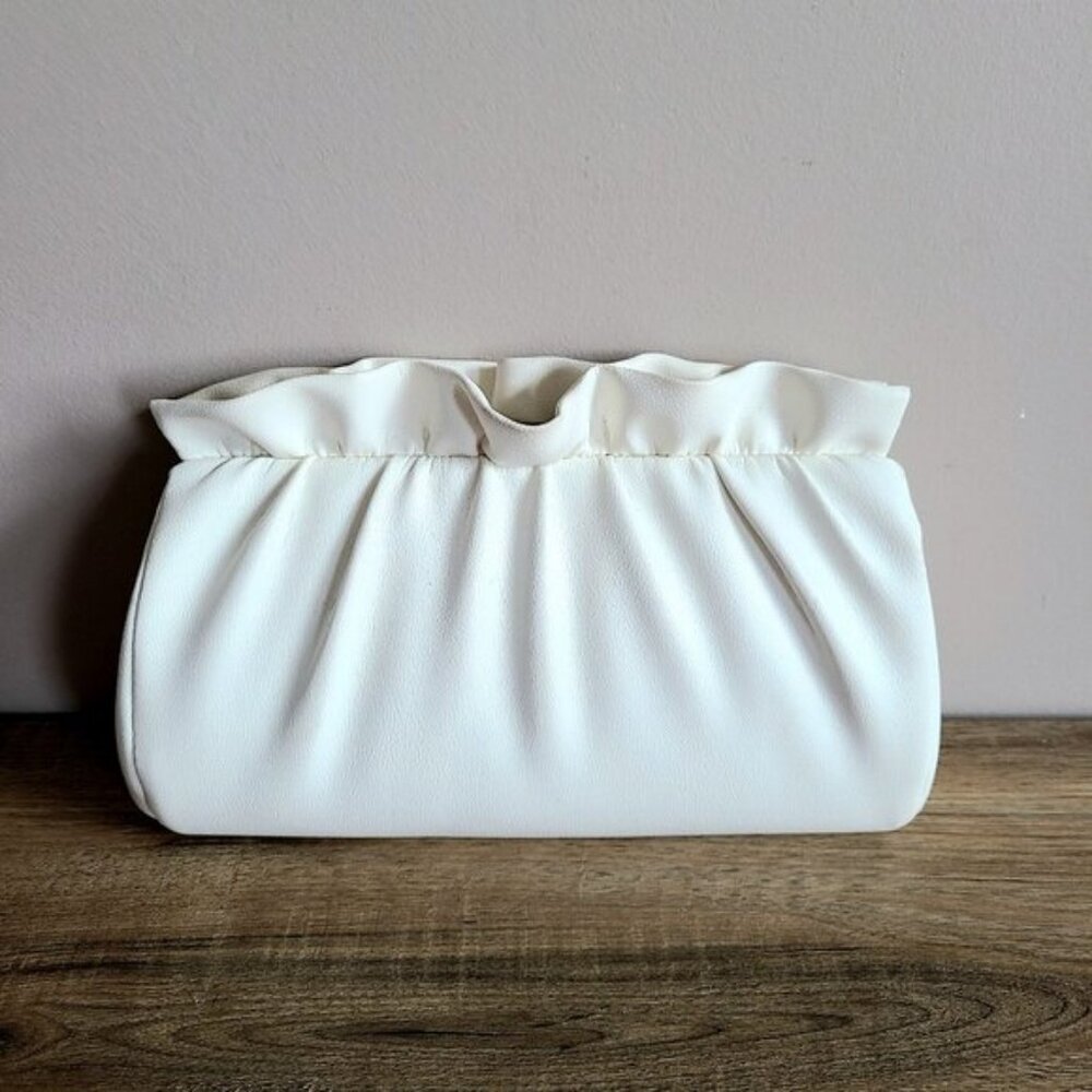 Beige vintage shoulder bag/clutch.